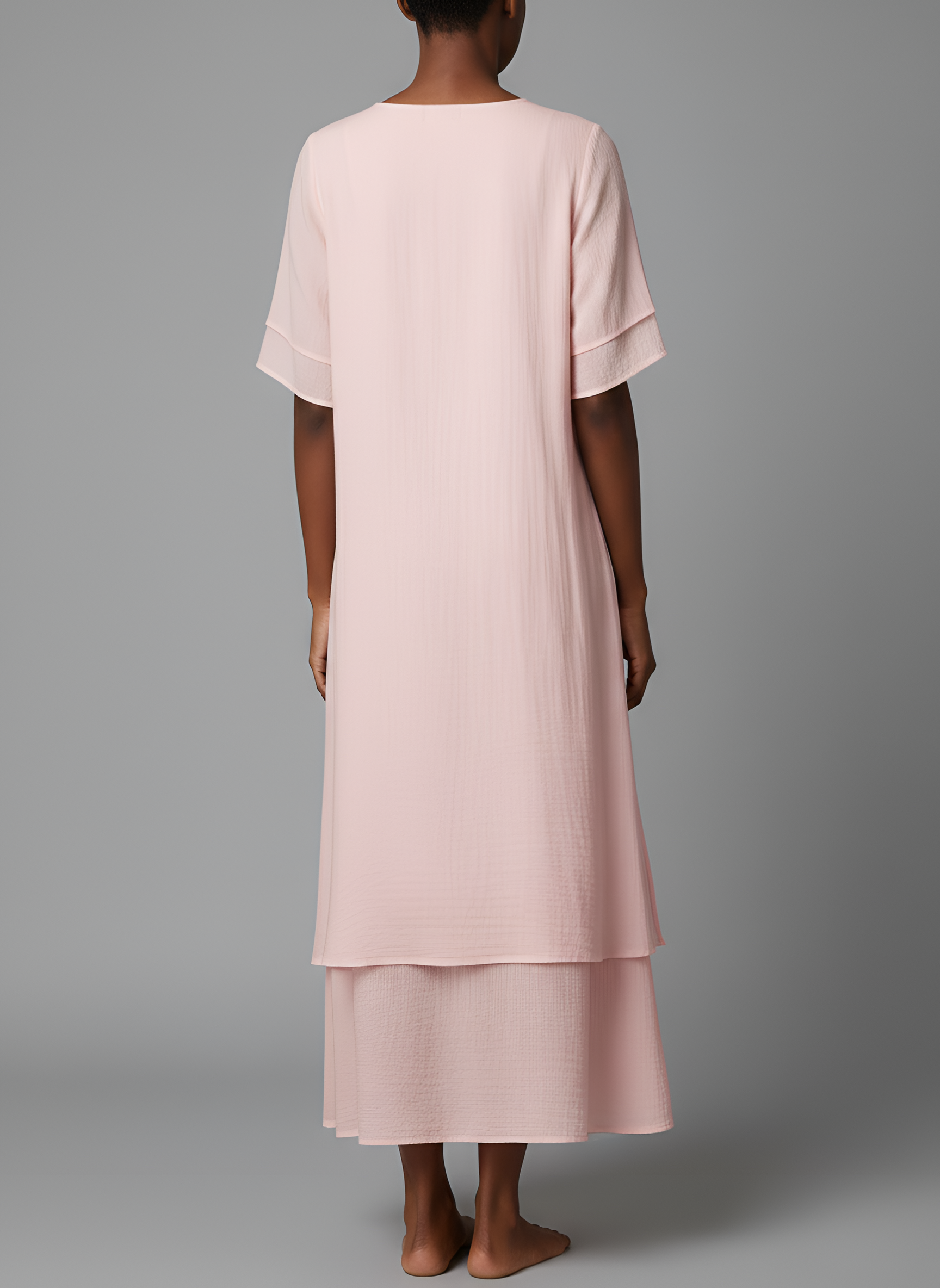 Robe longue en mélange de coton avec manches courtes et ourlet irrégulier