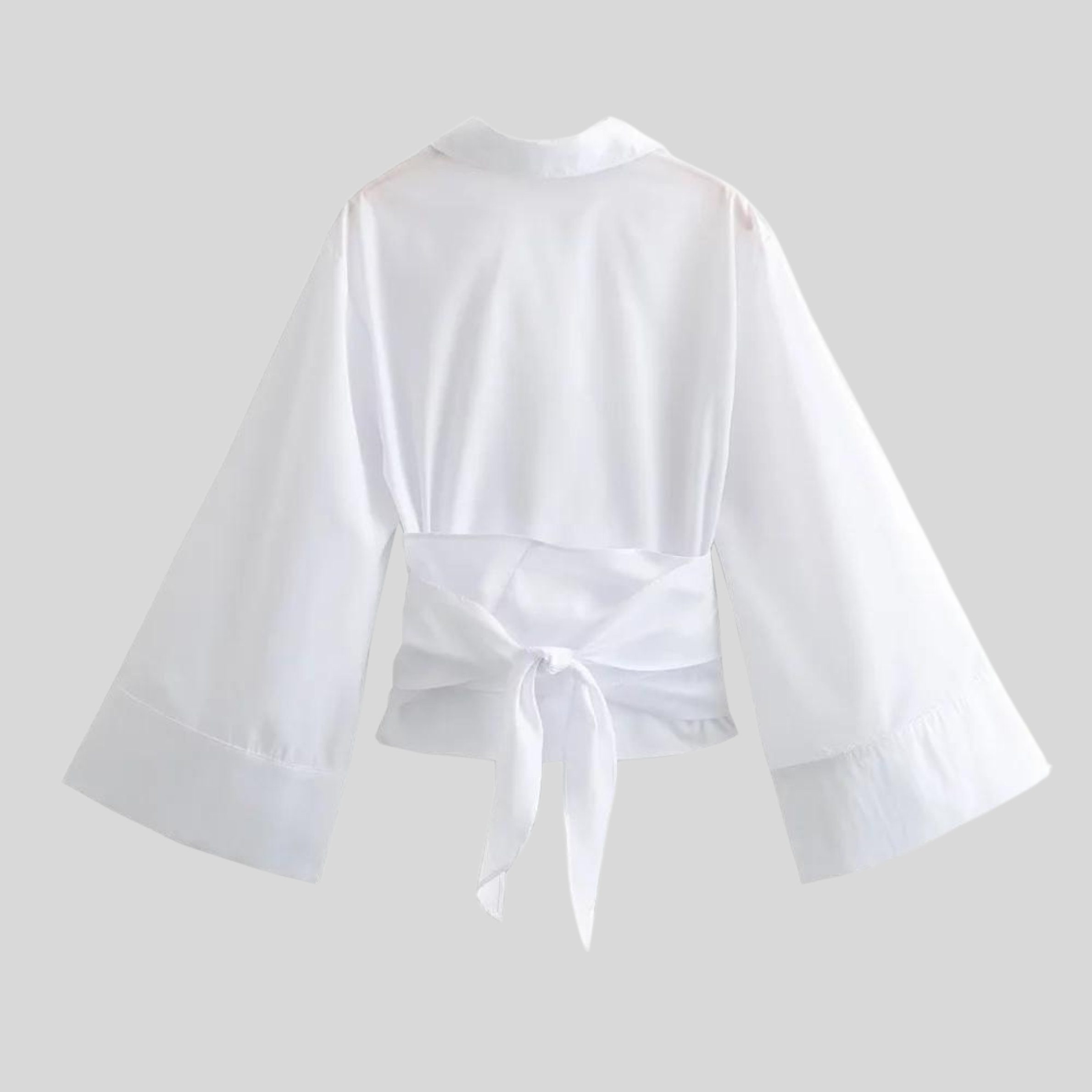 Chemise en popeline de coton avec col polo et ceinture à nouer pour femme