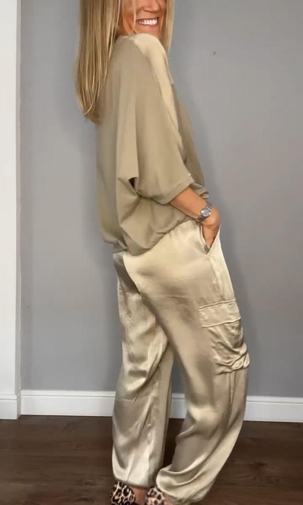 Completo in satin da donna con blusa a manica 3/4 e pantaloni con fiocco in vita