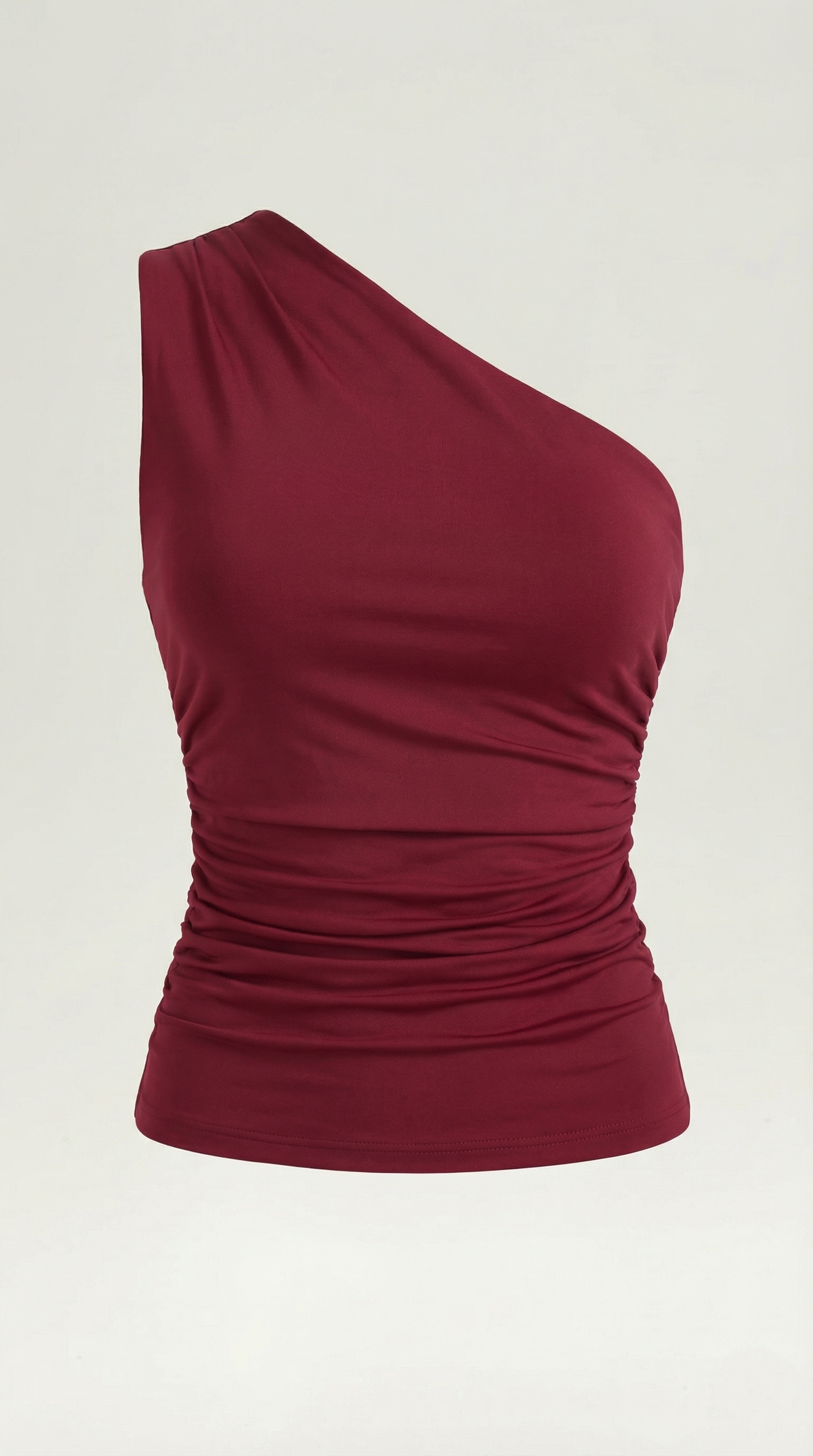 Top asymétrique à une épaule avec plis latéraux et coupe ajustée sans manches pour femme